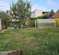 Garden of a family house in Tureň with a cottage and a greenhouse on Tureň Street.