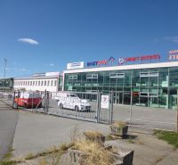 Commercial premises on Strojnícka Street in Prešov with large glass display windows.