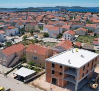 A view of an under-construction holiday apartment in Vodice with a view of the sea and surroundings.