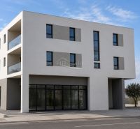 A recreational apartment in the city of Vodice with modern architecture and glass balconies.