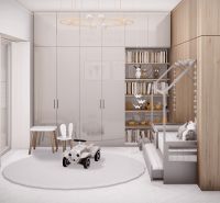 Children's room in a three-room apartment with a bed, table, books, and toys.