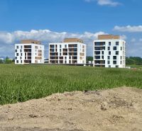 Buildings with flat roofs on Suchoňova Street in Poprad, the surroundings of 4-room apartments.