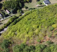 Aerial view of agricultural and forest lands in the village of Župkov.