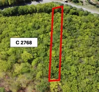 Aerial view of agricultural and forest land near Župkov with a marked parcel.