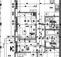 Architectural plan of a family house with the real estate agency's logo and the inscription 