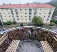 The balcony of a 2-room apartment on Rázus Street in Martin, Banská Bystrica, with a view of the street.