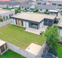 A family house on Milénium Street in Košúty with a spacious garden and terrace.
