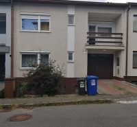 Family house on Astrova Street in Banská Bystrica with a balcony and driveway.
