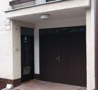 Family house on Astrova Street in Banská Bystrica with a garage and a balcony.