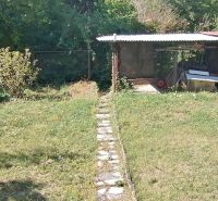 The garden at the family house on Astrová Street in Banská Bystrica with a gazebo.