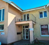 Two-story building with a balcony on Levočská Street in Stará Ľubovňa.