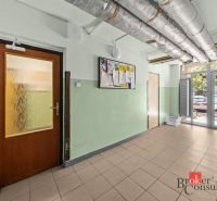 Interior with entrance, tiles, and a sign, suitable for a 3-room apartment.