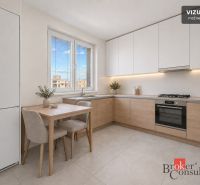A kitchen in a 3-room apartment with wooden decor, light furniture, and a large window.