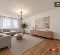 Living room in a 3-room apartment with a wooden decor floor, beige sofa, simple decorations.