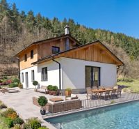 A family house in Lazy pod Makytou with a terrace, swimming pool, and surrounding nature.