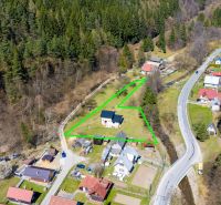An aerial view of a family house in Lazy pod Makytou, surrounded by forest.