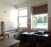 Commercial premises with freezing equipment and stainless steel furniture.