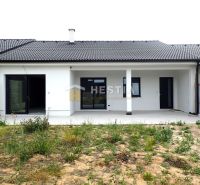 A family house in Hlboké with a terrace, new facade, and a grassed garden.