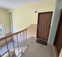 A staircase with a window leading to a 2-room apartment on Pod hájkom in Skalica.
