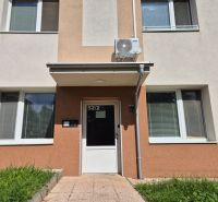 Entrance to the studio apartment on Kpt. Uhra Street, Myjava, with air conditioning on the facade.