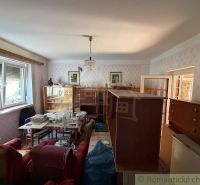Living room in a family house with furniture and decorations.
