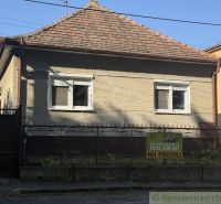 Family house for sale in Tvrdošovce, with a classic roof and a small front garden.