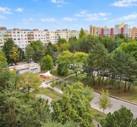 View of greenery and apartment buildings in Bratislava - Dúbravka on Gallayova Street.