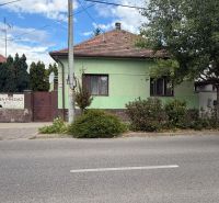 A family house on Šulekova Street in Nové Zámky with surrounding greenery.