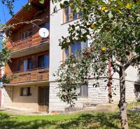 A family house on 17. novembra Street in Stará Ľubovňa, surrounded by fruit trees.