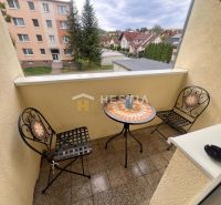 A balcony in a 3-room apartment with a view of the streets in Brezová pod Bradlom.