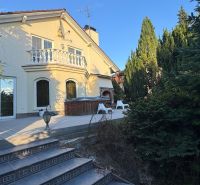 A family house in Trenčianske Stankovce with a garden, terrace, and outdoor seating.
