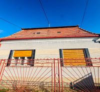 A family house in Dvory nad Žitavou on Dvory nad Žitavou Street with a sloped roof.