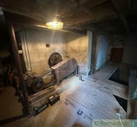Mansion of a family house with wooden furnishings and machinery.