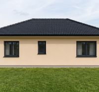 A family house on Hlavná Street in Svätý Peter with a pitched roof and a garden.
