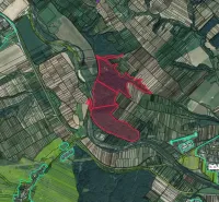 Aerial view of agricultural and forest land near Plaveč with visible marked areas.