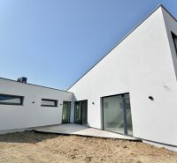 A family house in Šamorín on Kráľovianky with a minimalist design and large windows.