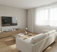 Living room with a comfortable sofa, television, and wooden decor flooring in a 3-room apartment.