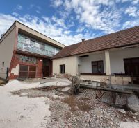 A family house on the main street in Krušovce, with a garage and an outdoor terrace.