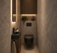 A narrow toilet in a 3-room apartment with an elegant sink and mirror.