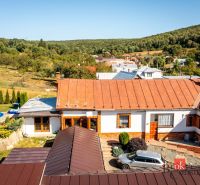 A family house in Potoky surrounded by nature with a pool in the garden.