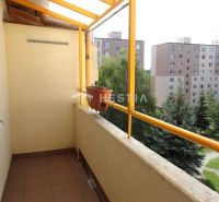 A balcony of a 3-room apartment with a view of the surroundings and panel buildings in Senica.