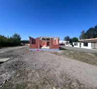 Construction of a family house in Kolónia in Michal na Ostrove with brick cladding.