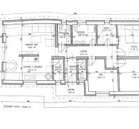 The floor plan of the family house shows the layout of the rooms, including the kitchen and living room.