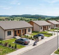 Family houses on Vlčany Street in the town of Vlčany, residential plots with parking.