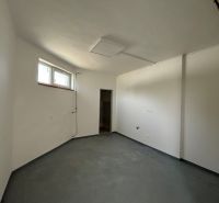 Interior of rooms Warehouses and halls with concrete floor and small window.