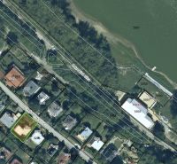 Aerial view of the Cottage on Rekreačná Street in Vrbové near the water body.