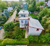 Aerial view of the cottage on Rekreačná Street in Vrbové surrounded by greenery.