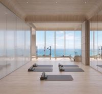 Interior of exercise spaces with a view of the sea, apartment construction.