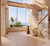 Interior with wood-patterned flooring and staircase, ocean view. Apartment construction.