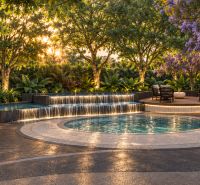 Luxury exterior with a pool and greenery, ideal for apartment development in the city of Pattaya.